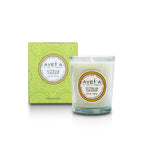 Bougie parfumée Tahiti Candles Citrus Cedar 80g en pot de verre avec sa boîte décorée de motifs polynésiens verts.