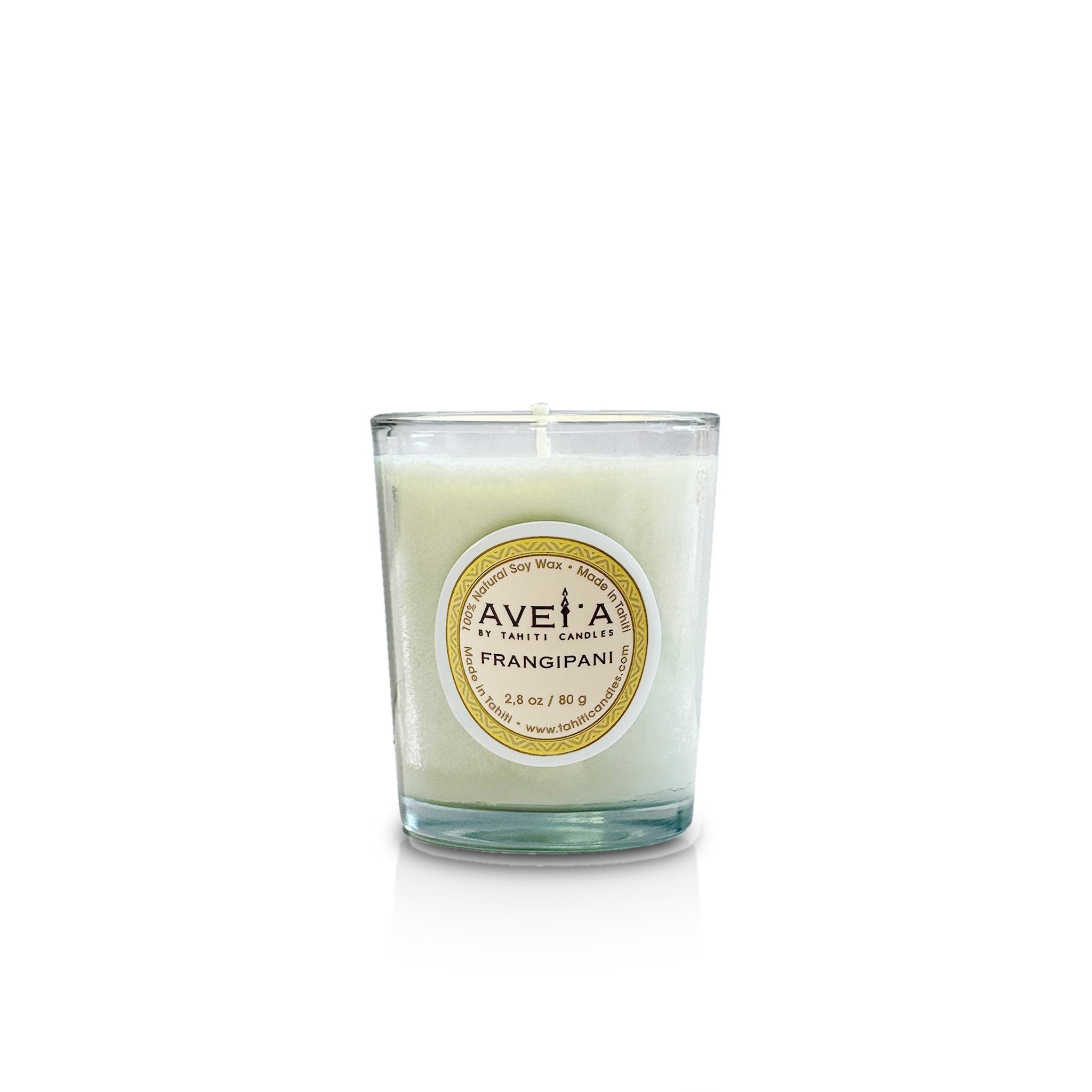 Bougie parfumée Tahiti Candles au frangipanier dans un pot en verre blanc de 80g avec mèche en coton naturel