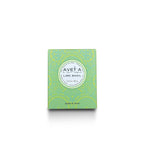 Boîte de bougie parfumée Tahiti Candles Lime Basil 80g avec motifs polynésiens verts et blancs