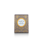 Boîte de bougie Tahiti Candles Orange Santal 80g avec motifs polynésiens dorés sur fond violet