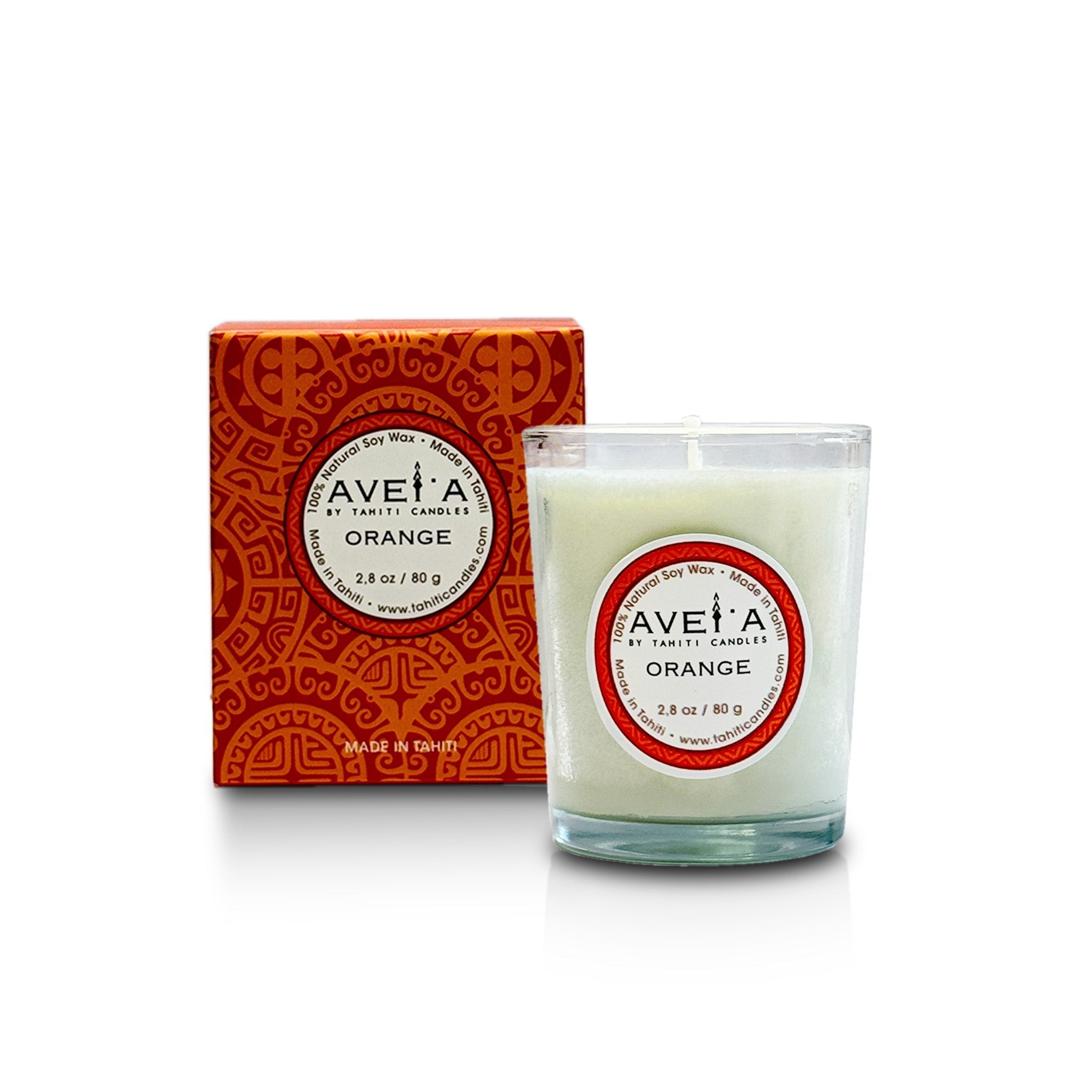 Bougie parfumée Tahiti Candles à l'orange dans un pot en verre avec sa boîte décorative orange à motifs polynésiens