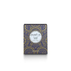 Bougie parfumée Tahiti Candles Tiare Oud 80g dans son emballage bleu et doré aux motifs polynésiens artisanaux