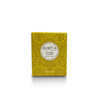 Bougie parfumée Tahiti Candles Ylang Ylang 80g dans son emballage jaune décoré de motifs polynésiens traditionnels.